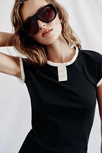 TOP LISERÉS À BOUTONS