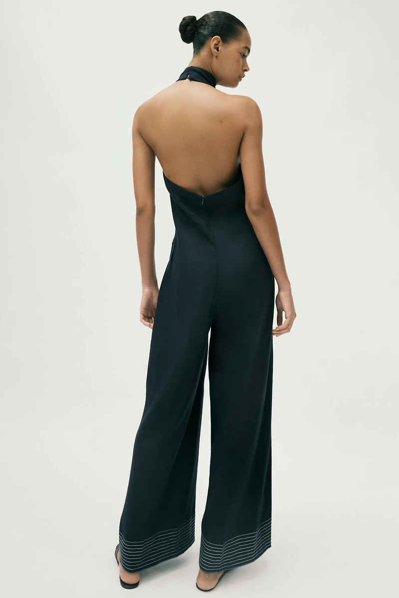 LINEN HALTER JUMPSUIT WITH CONTRAST TOPSTITCHING