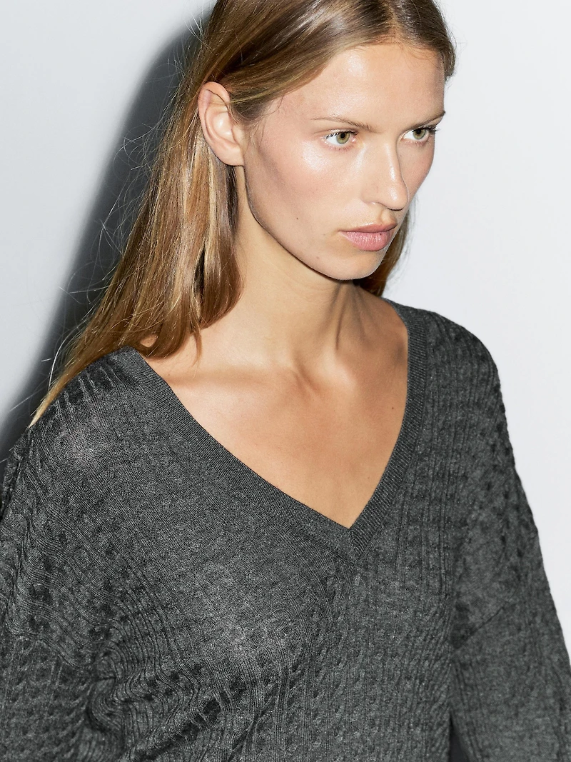 V-neck cable-knit sweater