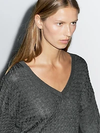 V-neck cable-knit sweater