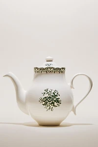 THÉIÈRE EN FAÏENCE À MOTIF FLORAL