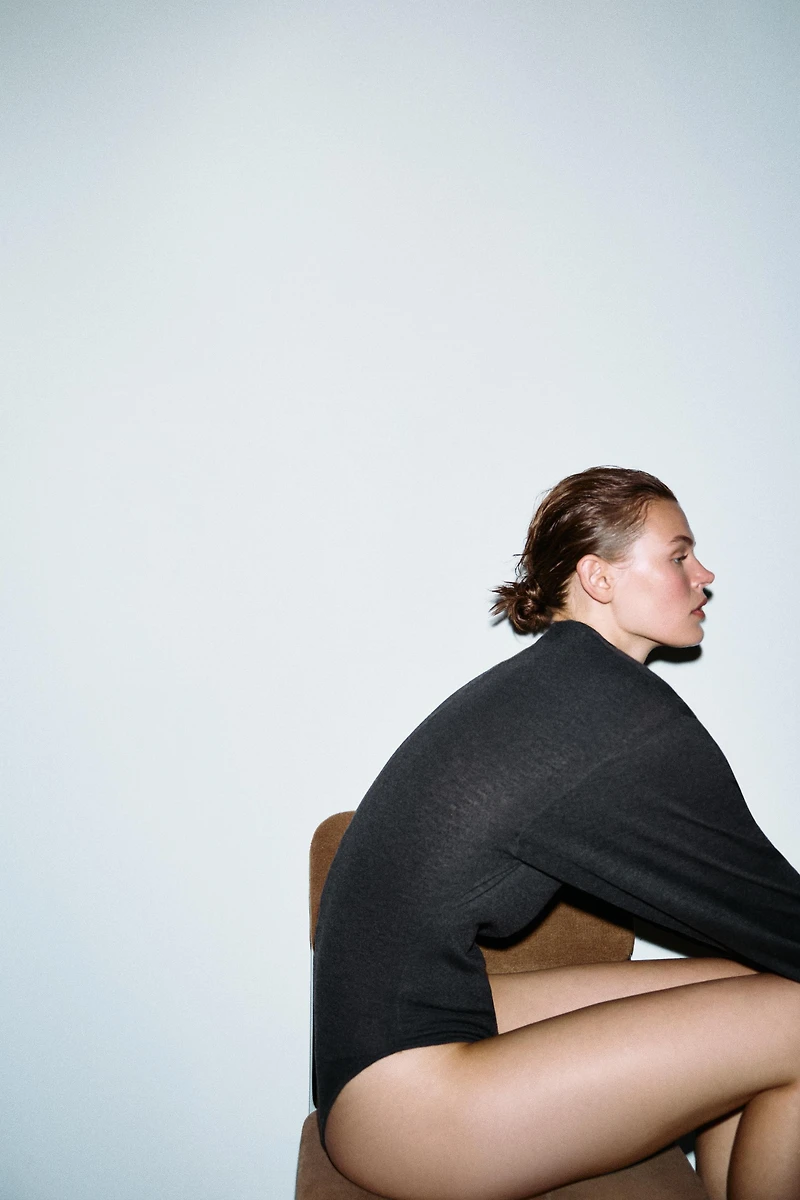 SHOULDER PAD KNIT BODYSUIT