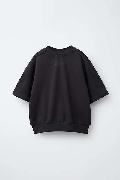 T-SHIRT EN MOLLETON AVEC INSCRIPTION