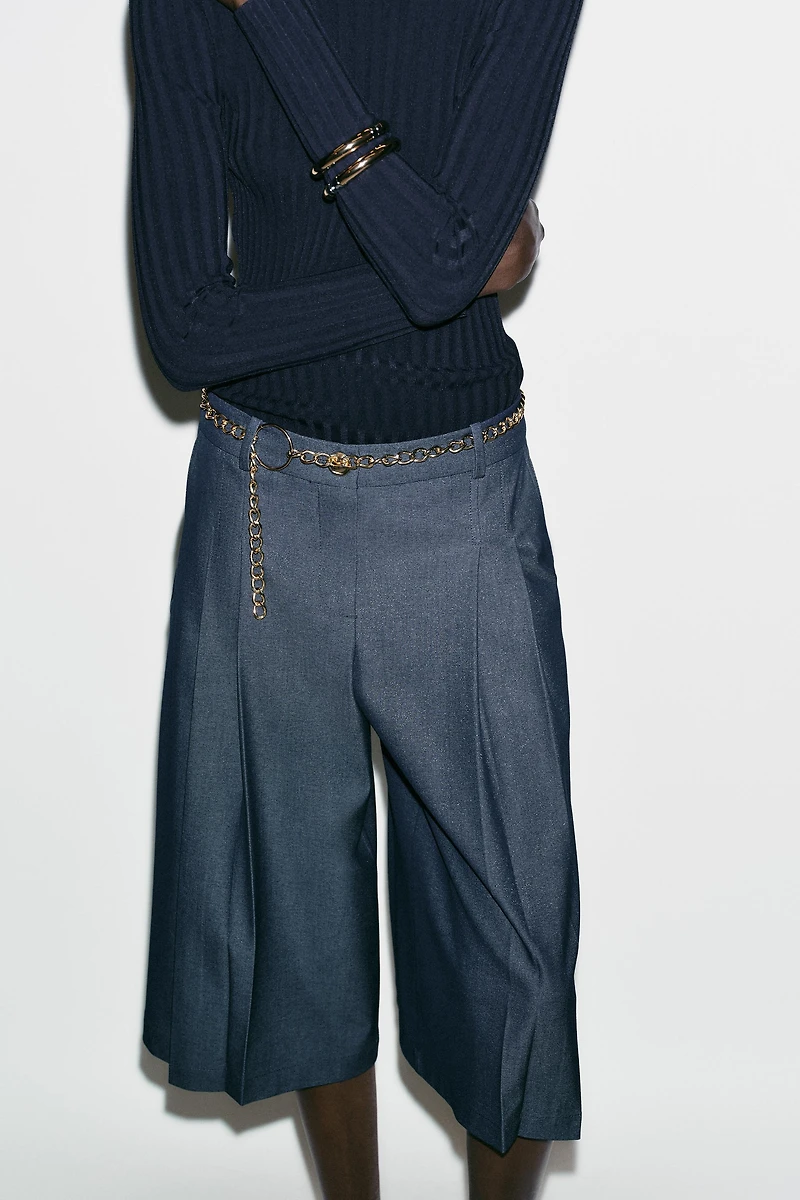 BELTED CHAIN LONG SHORTS