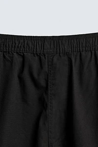 BALLOON FIT PLEATED PANTS
