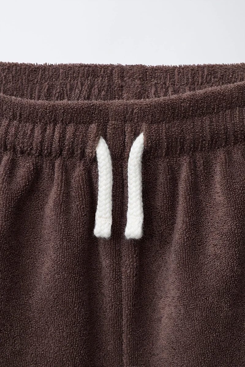 SHORT EFFET ÉPONGE AVEC ÉTIQUETTE