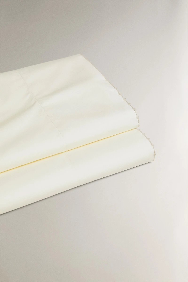 FLAT SHEET WITH EMBROIDERED TRIM
