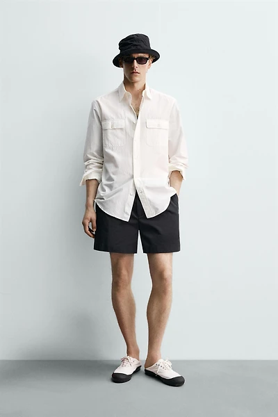 SHORT PLISSÉ COURT AARON LEVINE X ZARA