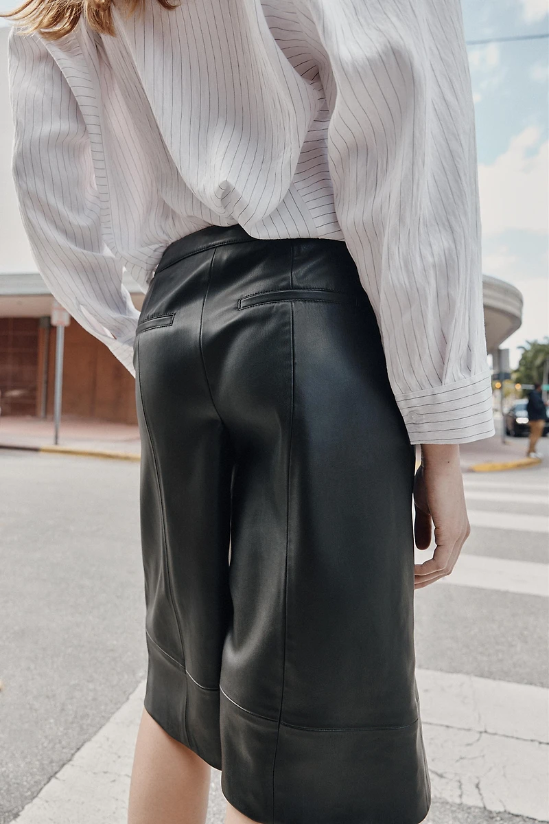 FAUX LEATHER LONG SHORTS