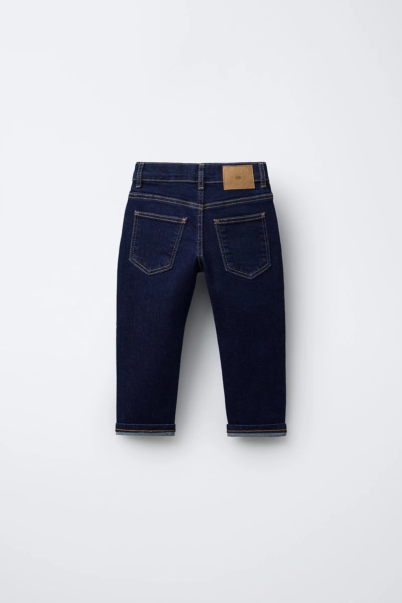 STRAIGHT FIT JEANS