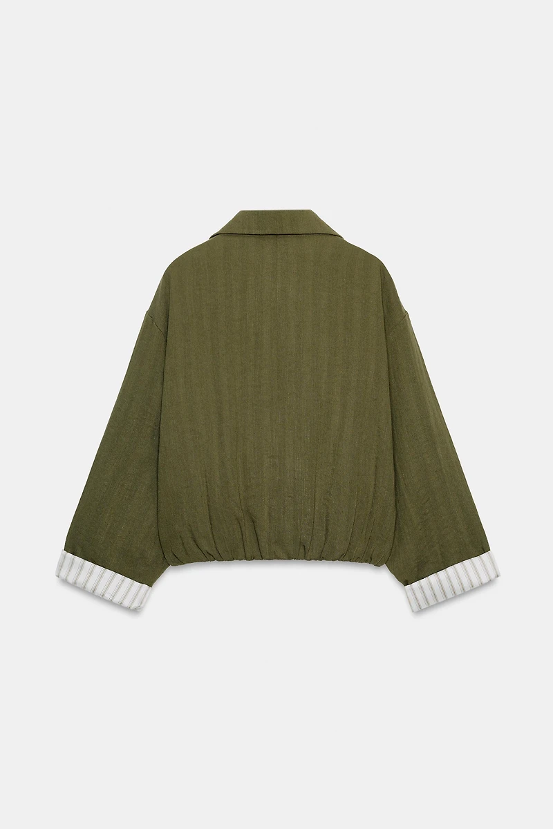 SHORT JACKET WITH ROLLED-UP SLEEVES