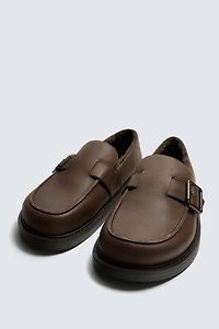 BUCKLED LEATHER CLOGS
