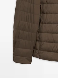 Reversible water-repellent down blend waistcoat