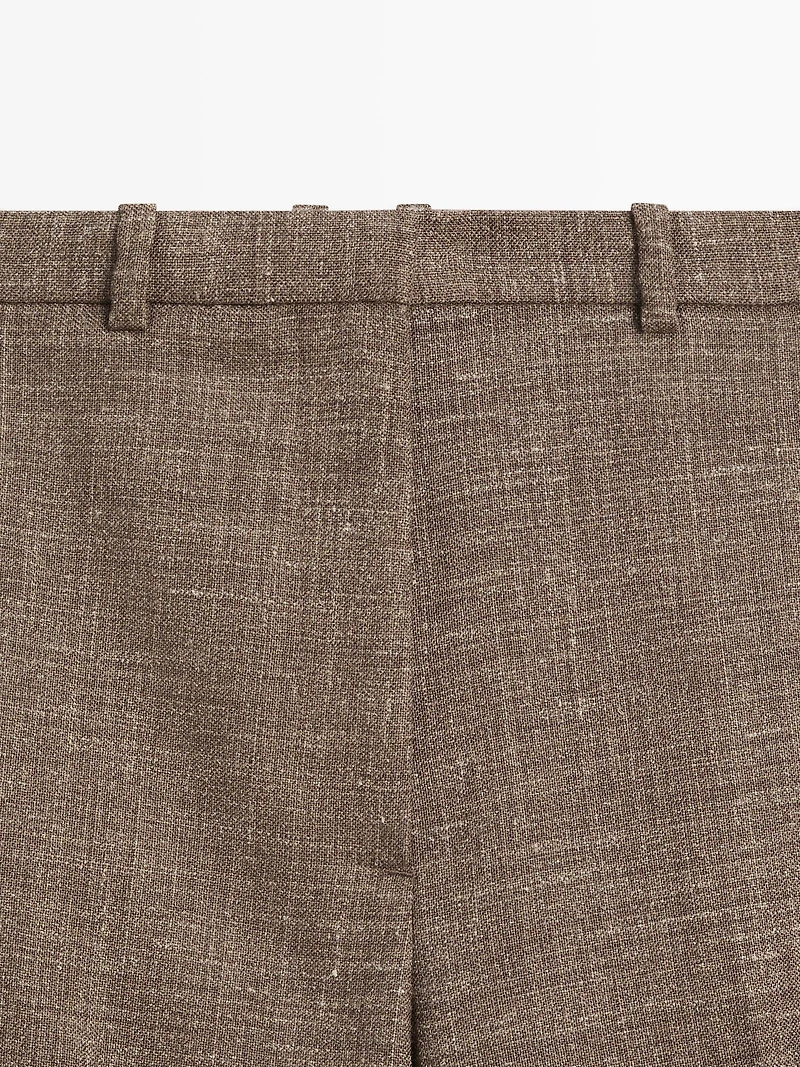 Wide-leg voluminous wool blend trousers