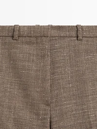 Wide-leg voluminous wool blend trousers