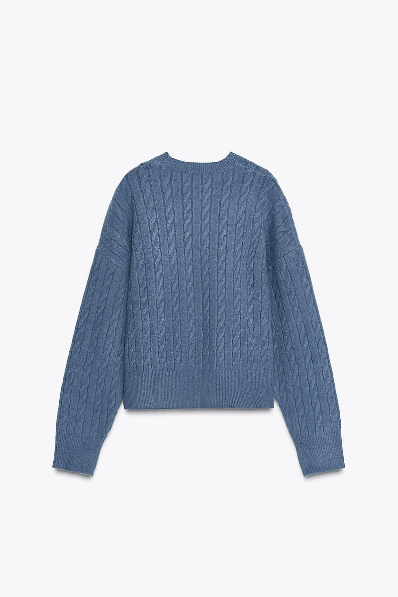 PULL EN MAILLE À TORSADES