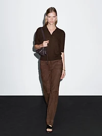 Polo laine en maille tressée