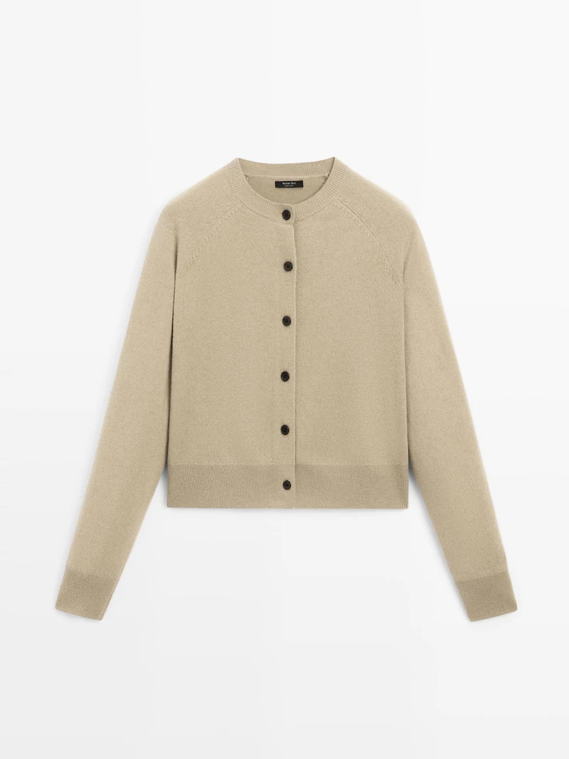 Short knit cardigan with raglan sleeves