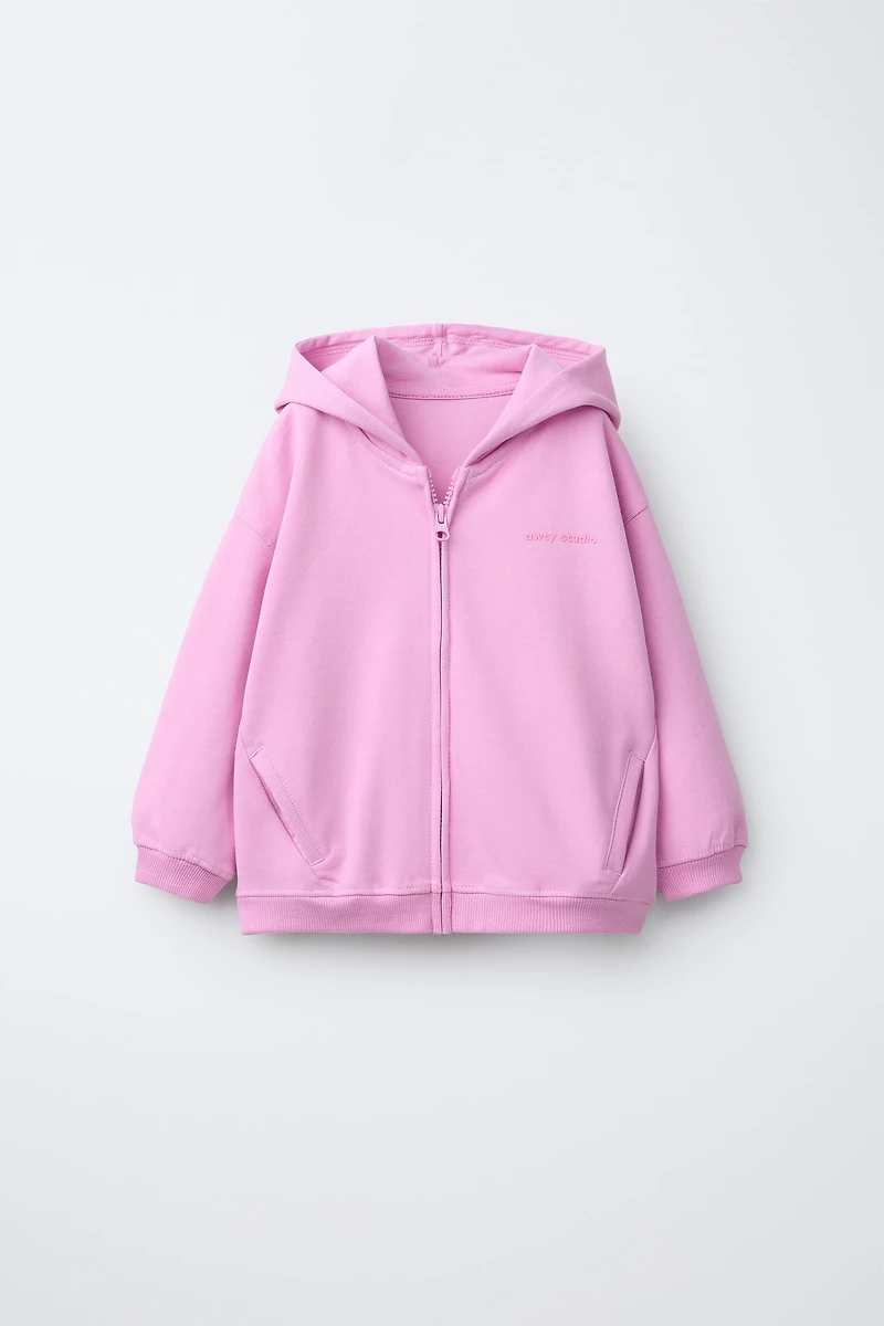 INTERLOCK ZIP SWEATSHIRT WITH RAISED TEXT