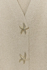 VESTE STRUCTURÉE EN MAILLE BOUTON ÉTOILE