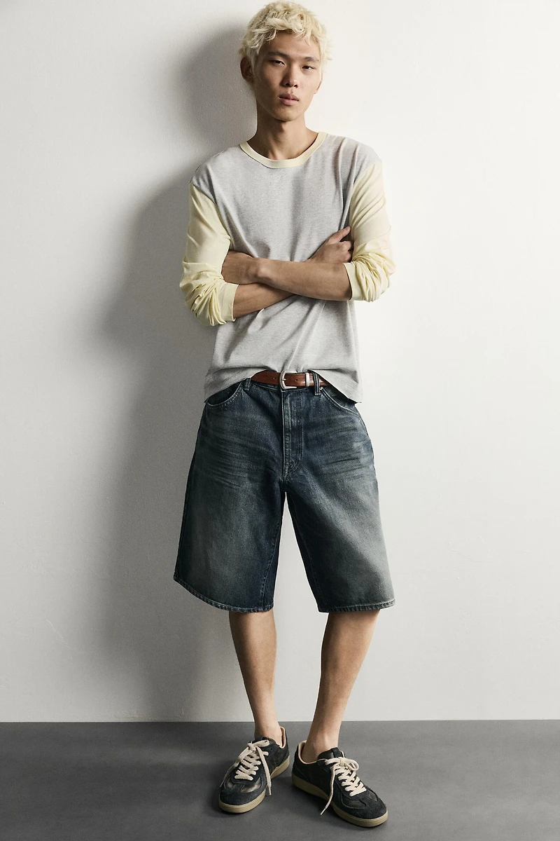 BAGGY FIT DENIM SHORTS WITH LEATHER POCKETS