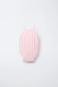 THREE-PACK OF RIB KNIT BODYSUITS WITH CUTOUT DETAIL