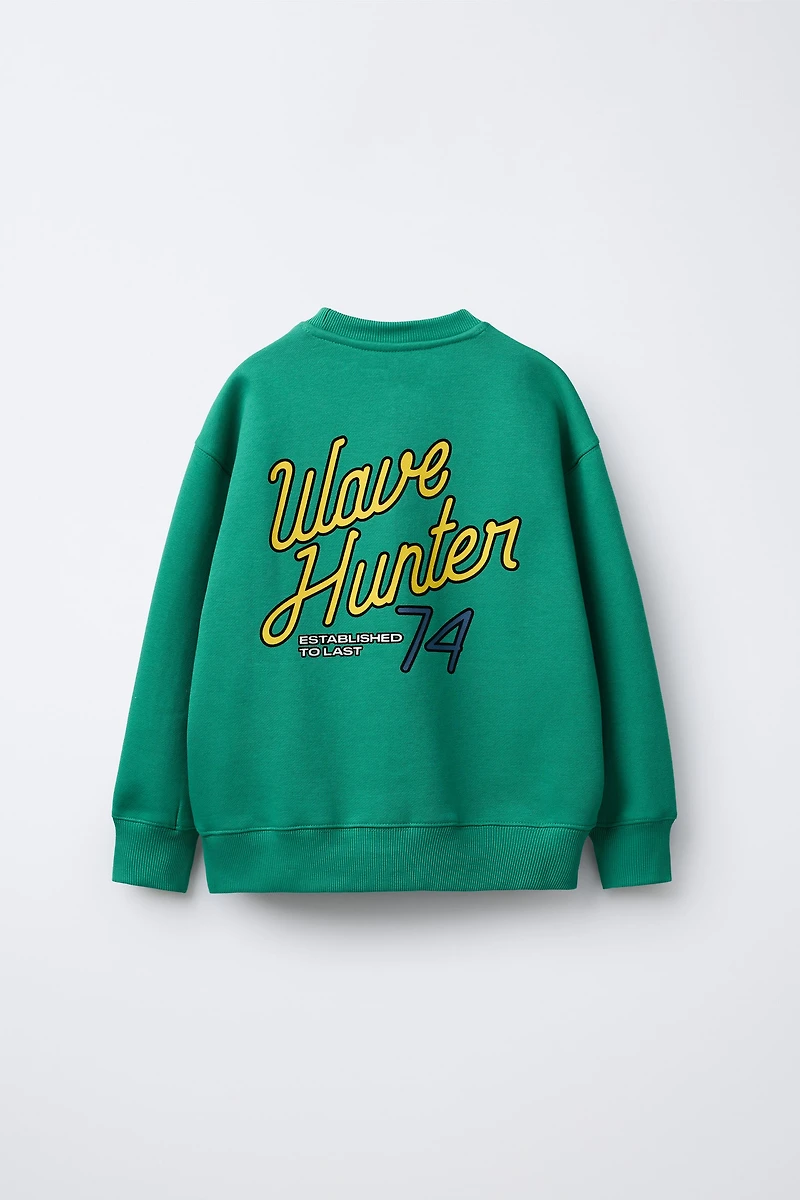 FLOCKED PRINT SWEATSHIRT