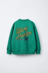 FLOCKED PRINT SWEATSHIRT