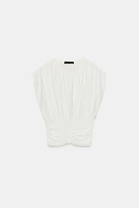 TOP DRAPÉ EN MAILLE