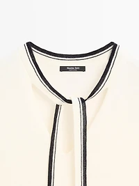 Knit vest with tie detail