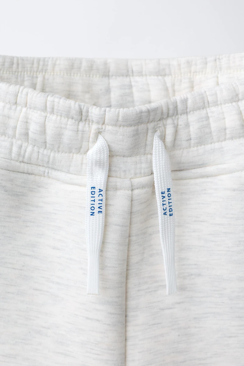 PANTALON SPORT LOGO NÉOPRÈNE