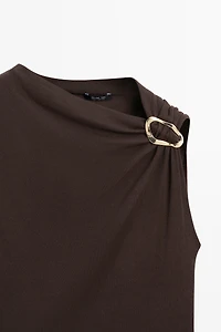 Asymmetric top with rhinestone detail