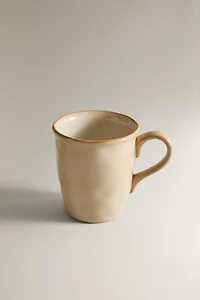 STONEWARE MUG WITH IRREGULAR EDGE