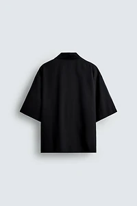 FLOWY SHIRT WITH EMBROIDERED TEXT