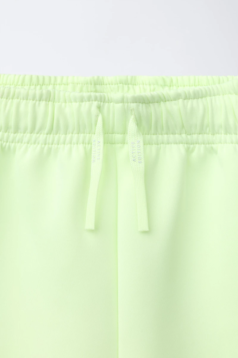 NEON NEOPRENE ATHLETIC SHORTS