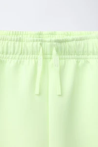 NEON NEOPRENE ATHLETIC SHORTS