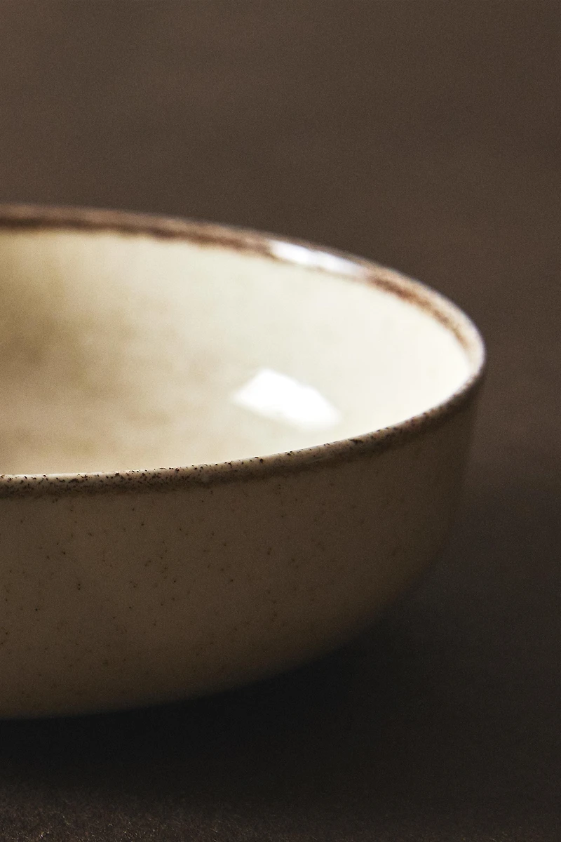 PORCELAIN BOWL WITH ANTIQUE FINISH RIM