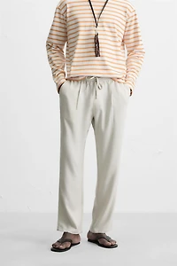 RELAXED FIT FLOWY PANTS