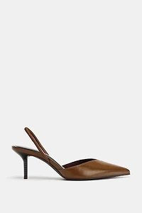 CHAUSSURES À TALONS OUVERTES L'ARRIÈRE