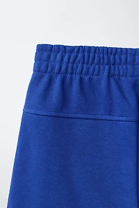 SHORT EN MOLLETON UNI