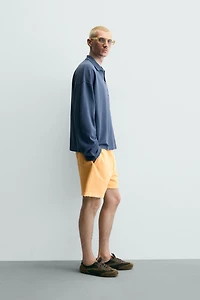 POLO RELAXED FIT EN PIQUÉ AVEC PATCHS CHIFFRES