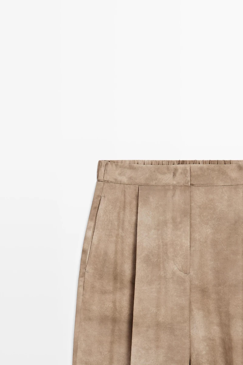 Flowing pants with tie-detail hem