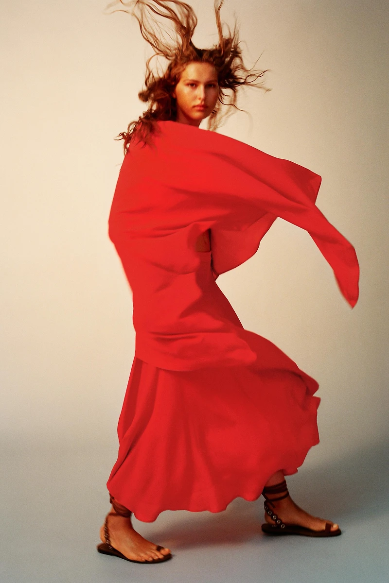 ASYMMETRIC FLOWING CAPE