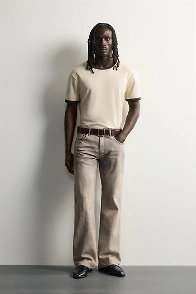 LOW-RISE VINTAGE-EFFECT BOOTCUT JEANS