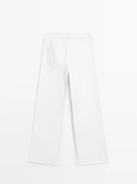 Textured wide-leg denim-effect trousers