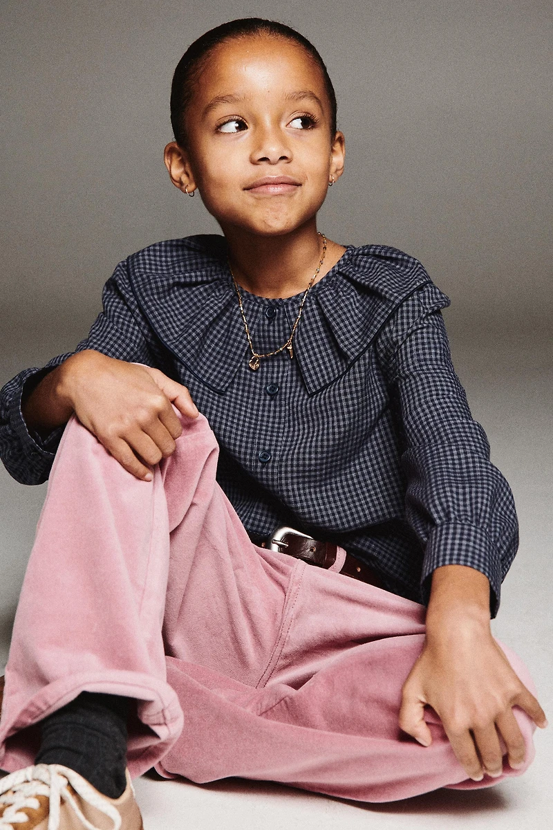 PANTALON EN VELOURS À FLEURS BRODÉES