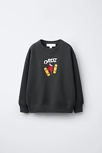 SKATE PRINT SWEATSHIRT