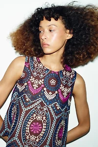 EMBROIDERED EYELET TOP