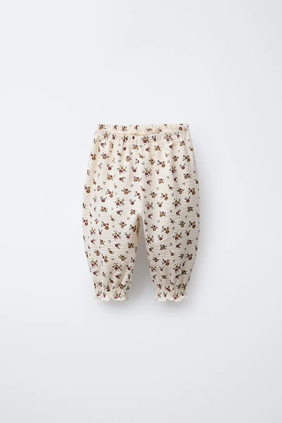 FLORAL EMBOSSED PANTS
