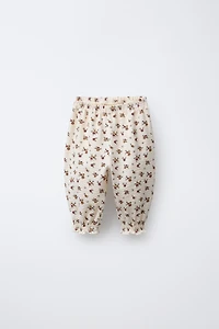 FLORAL EMBOSSED PANTS